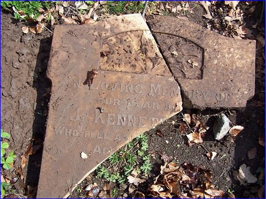 L Cpl. William Oswyn Hill's headstone before restoration